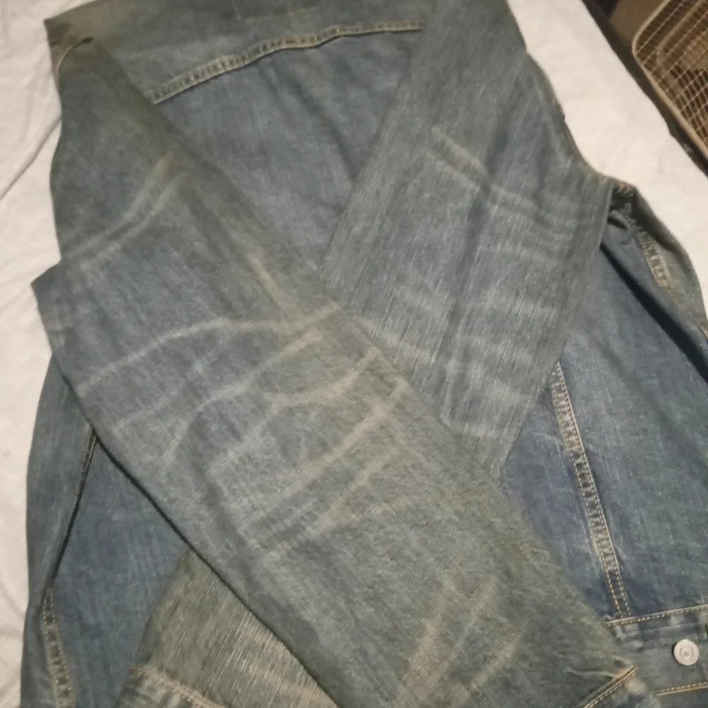 Levi's Faded Blue Denim Trucker Jacket